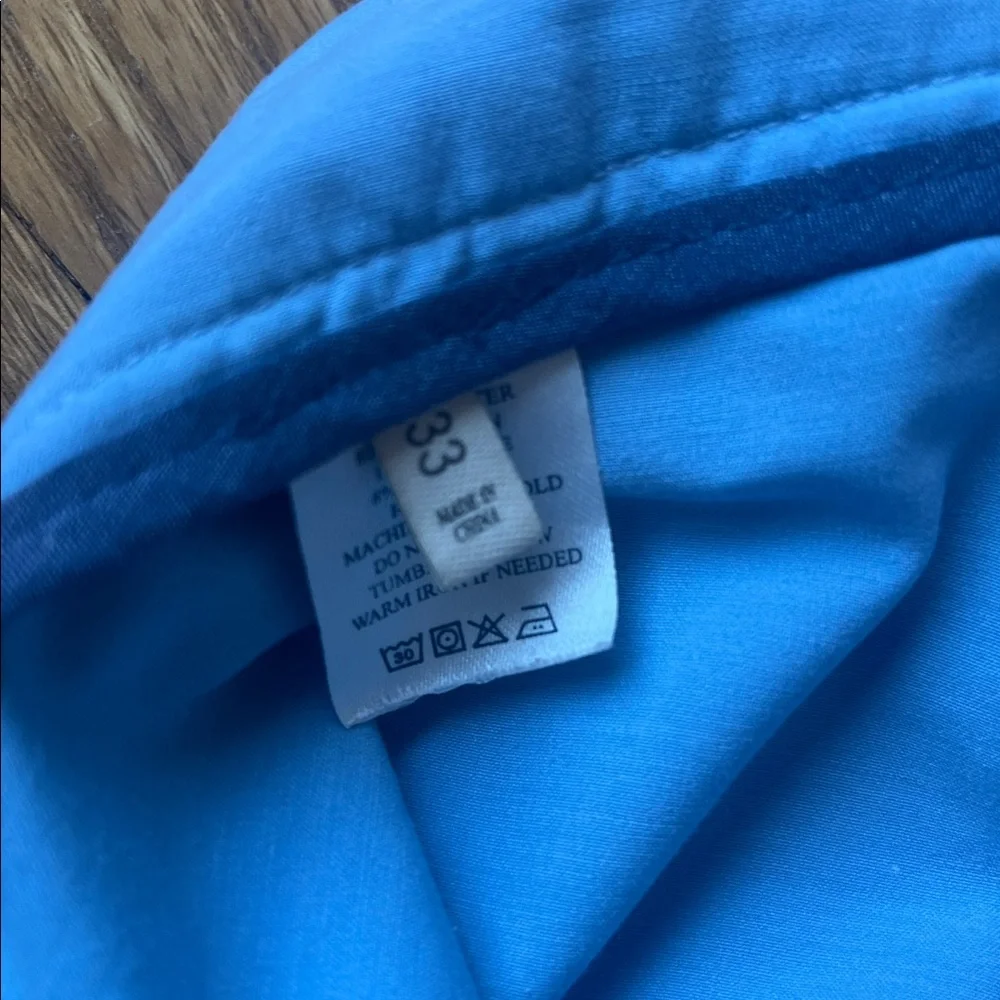 Faherty All Day Shorts, light blue size 33, button, zipper and drawstring.